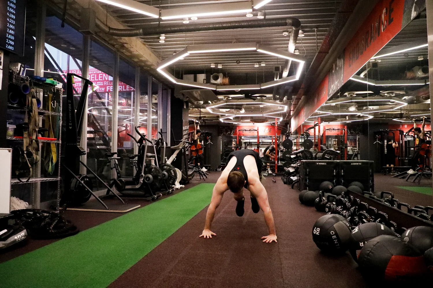 Burpee broad jumps training at UFC Gym Yoga